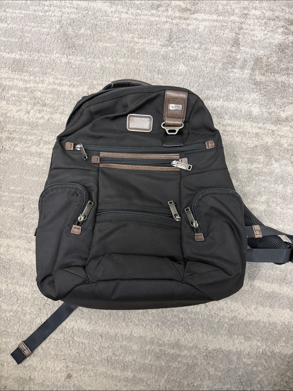 Tumi Black Backpack with Brown Leather Accents